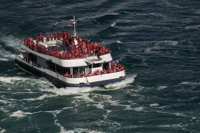 Niagara city cruises'niagara wonder passengers moving to the base of niagara falls on oct. 10, 2024.
