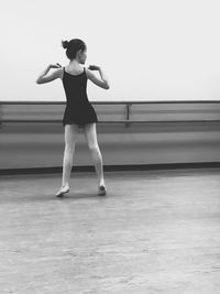 Full length of woman standing on stage