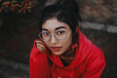 Close-up of young woman looking away