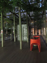 Empty chairs and tables in restaurant