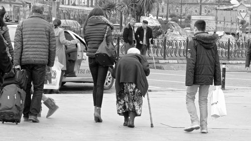 People walking on city street