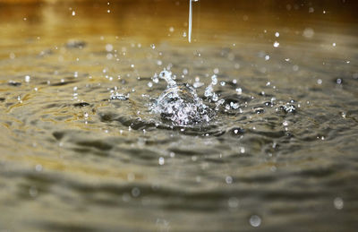 Close-up of water splashing on surface