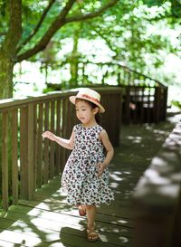 Portrait of happy girl walking outdoors