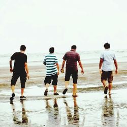 Boy enjoying at beach