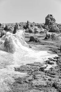 Rock formations in desert against sky