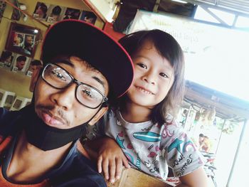 Portrait of happy siblings