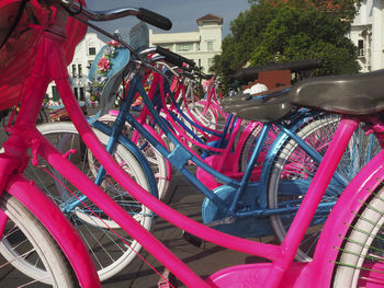 Close-up of bicycles parked in row