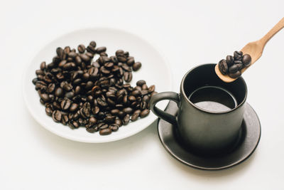 Close-up of coffee beans on table