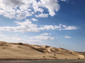 Scenic view of desert against sky