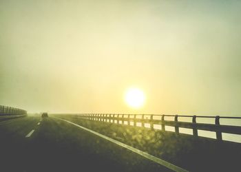 Road against sky during sunset