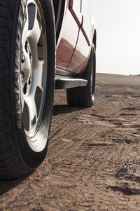 Close-up of vintage car on road