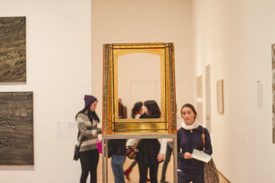 People standing in corridor