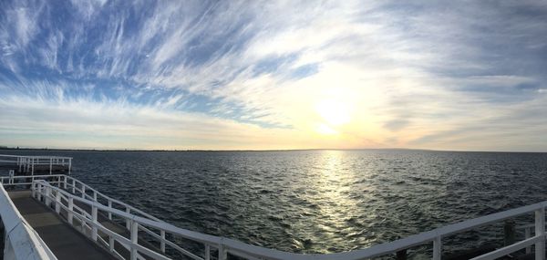 Scenic view of sea against sky at sunset