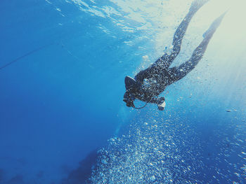 Person swimming in sea