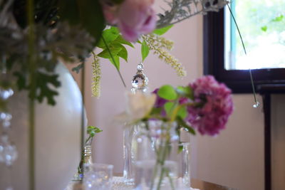 Close-up of vase on table at home