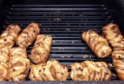 High angle view of meat on barbecue grill