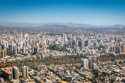 Aerial view of cityscape against sky