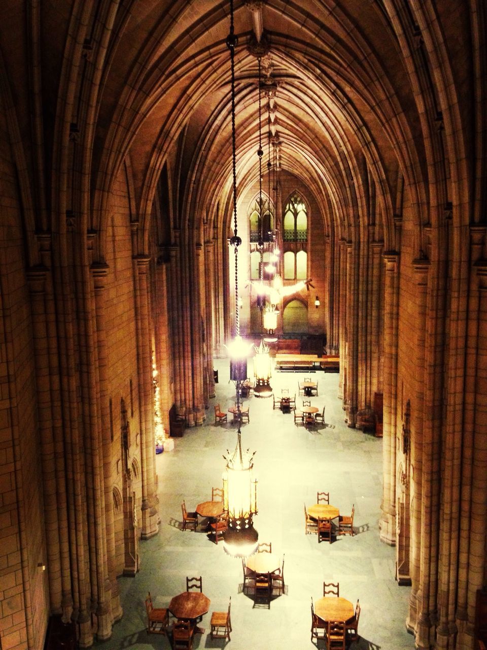 indoors, architecture, arch, built structure, transportation, mode of transport, interior, architectural column, incidental people, in a row, empty, the way forward, travel, corridor, place of worship, church, day, car, diminishing perspective, absence