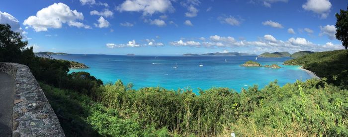 Scenic view of sea against blue sky