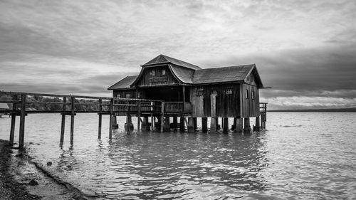 Pier over sea against sky