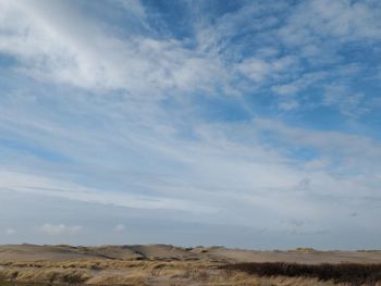 Scenic view of desert against sky