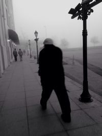 Full length of woman in shopping mall