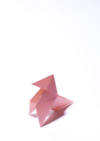 High angle view of paper toy against white background
