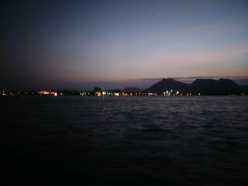 Scenic view of sea against sky at night