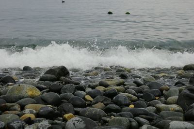 Waves breaking on rocks