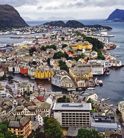 High angle view of townscape by sea