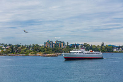 Nautical vessel in sea against sky