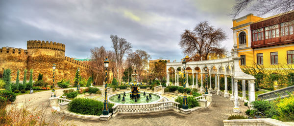 Panoramic view of park and buildings against sky