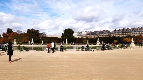 People at park against sky