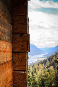 View of wooden structure against cloudy sky