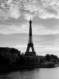 View of tower against cloudy sky