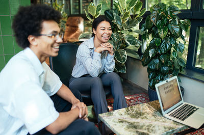 Business colleagues working at table