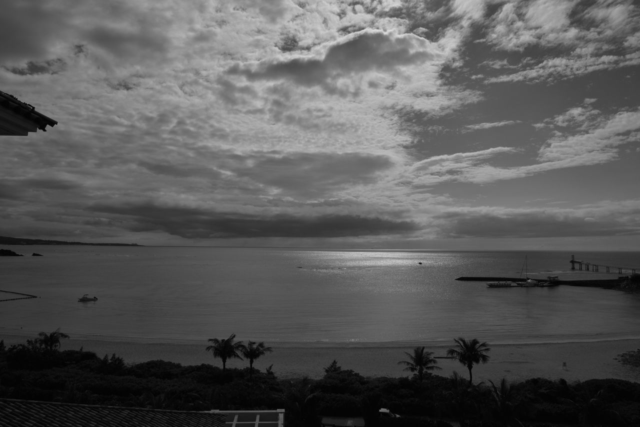 sea, sky, water, cloud - sky, horizon over water, transportation, mode of transport, cloudy, scenics, beauty in nature, nautical vessel, tranquility, tranquil scene, nature, sunset, beach, boat, cloud, shore, weather