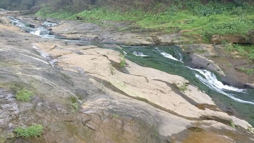 Scenic view of river flowing through landscape