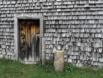 View of old abandoned building, larch shingles in bavaria, alpine hut detail