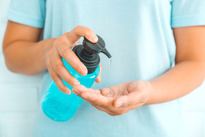 Close-up of man holding camera