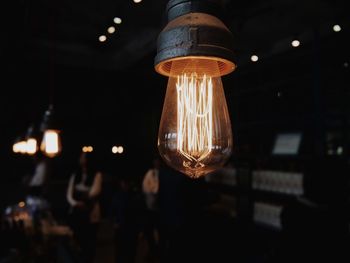 Close-up of illuminated light bulb