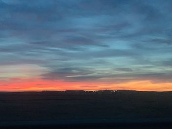 Scenic view of silhouette landscape against sky during sunset