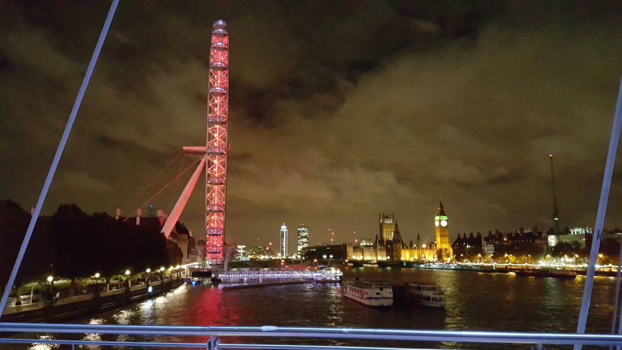 water, illuminated, architecture, built structure, waterfront, night, sky, river, nautical vessel, transportation, city, building exterior, suspension bridge, bridge - man made structure, harbor, crane - construction machinery, connection, development, cloud - sky, travel destinations