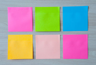 High angle view of multi colored umbrellas on table