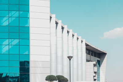 Low angle view of building against blue sky