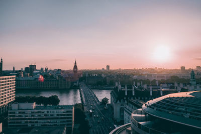 Cityscape against sky during sunset