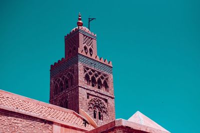 Low angle view of building against blue sky