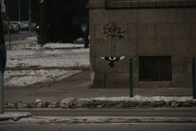 View of road along buildings
