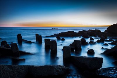 Scenic view of sea against sky during sunset