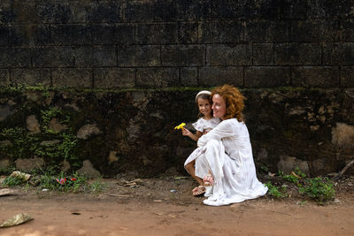 A mother hugs her little daughter with great love. the concept of family. women in society. have fun